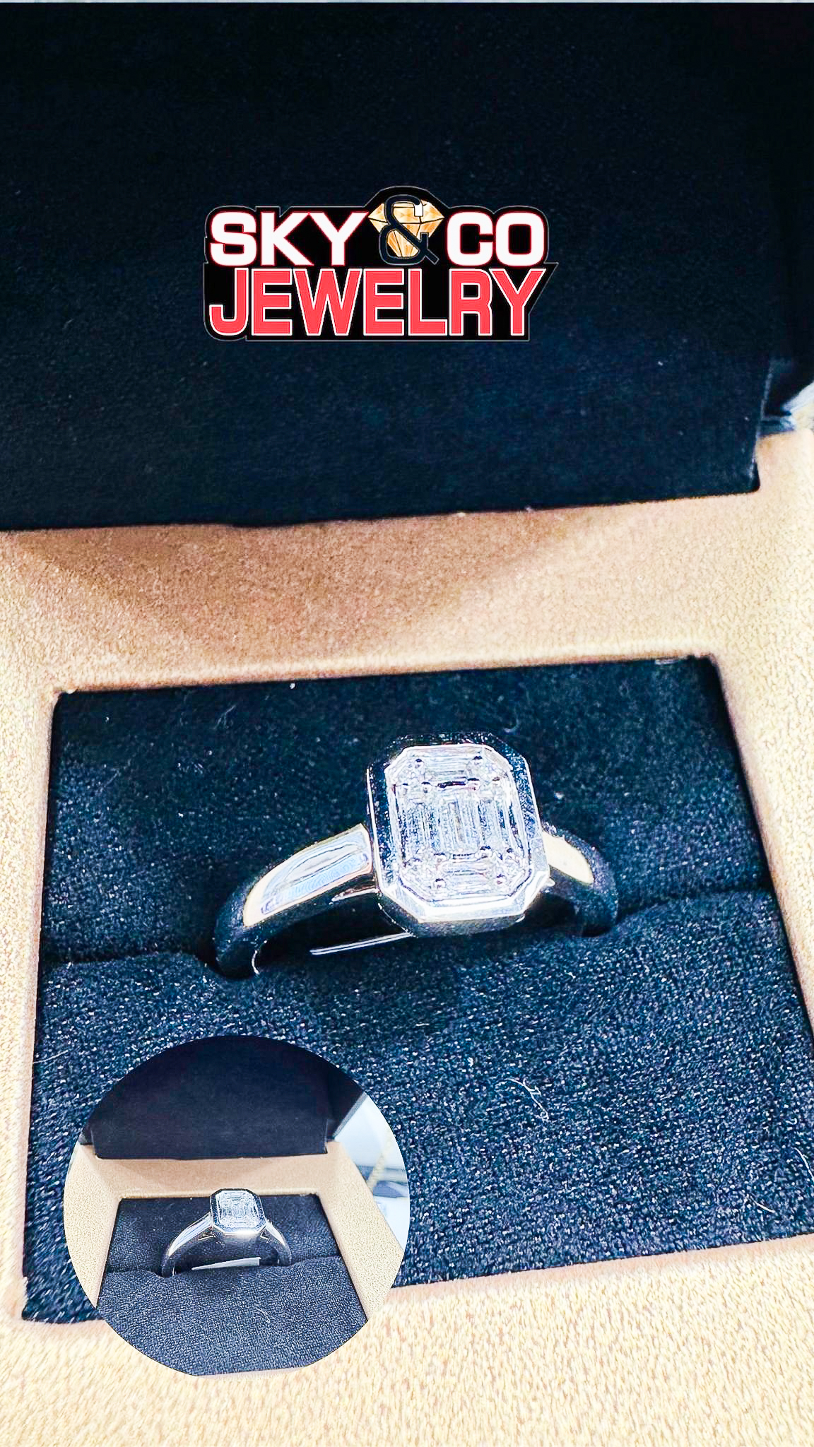 Classic emerald-cut diamond solitaire engagement ring in Sky & Co presentation box